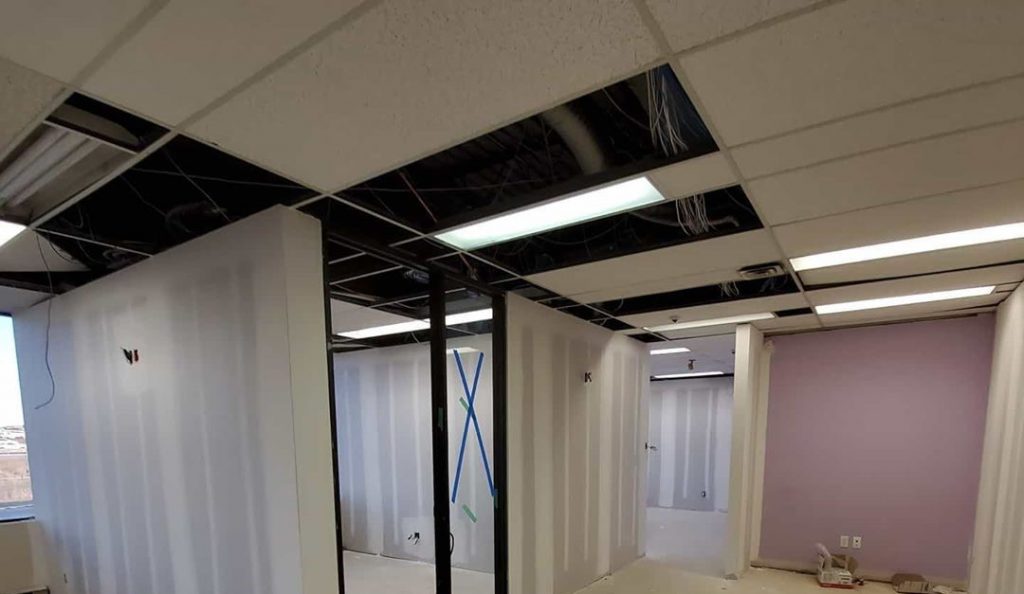 in progress of installing Suspended Ceiling by drywall toronto